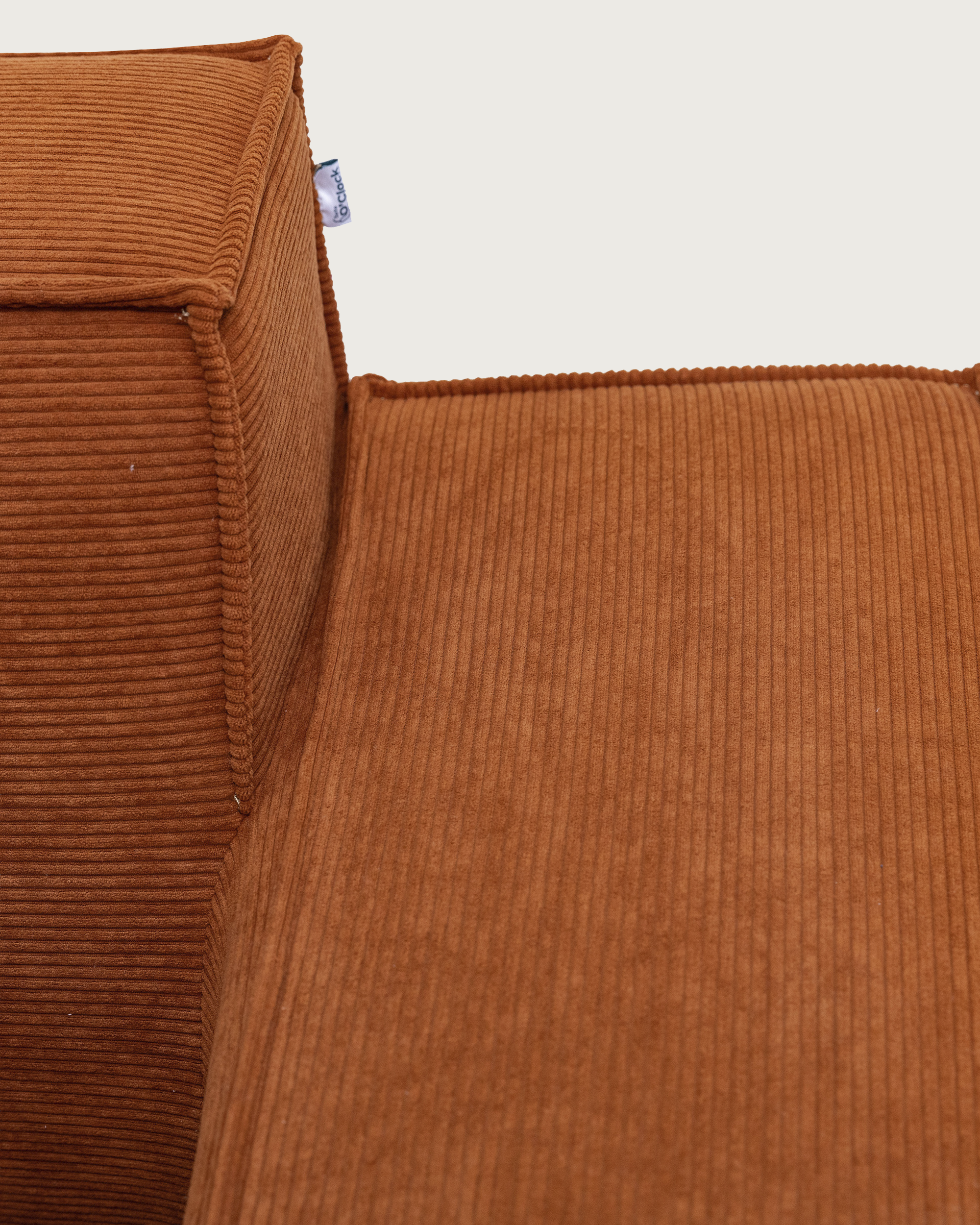 Brel 2-Seater Sofa detail in orange ribbed fabric