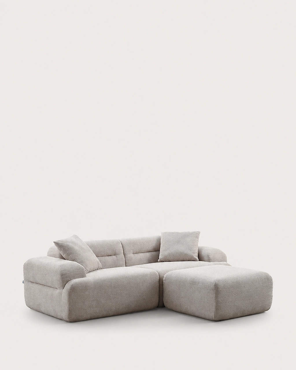 Elvis 3-piece modular sofa with ottoman in sand beige textured fabric