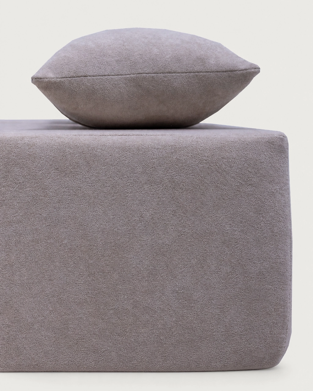 Detail of Lennon 2-seater sofa bed cushion and base in taupe fabric