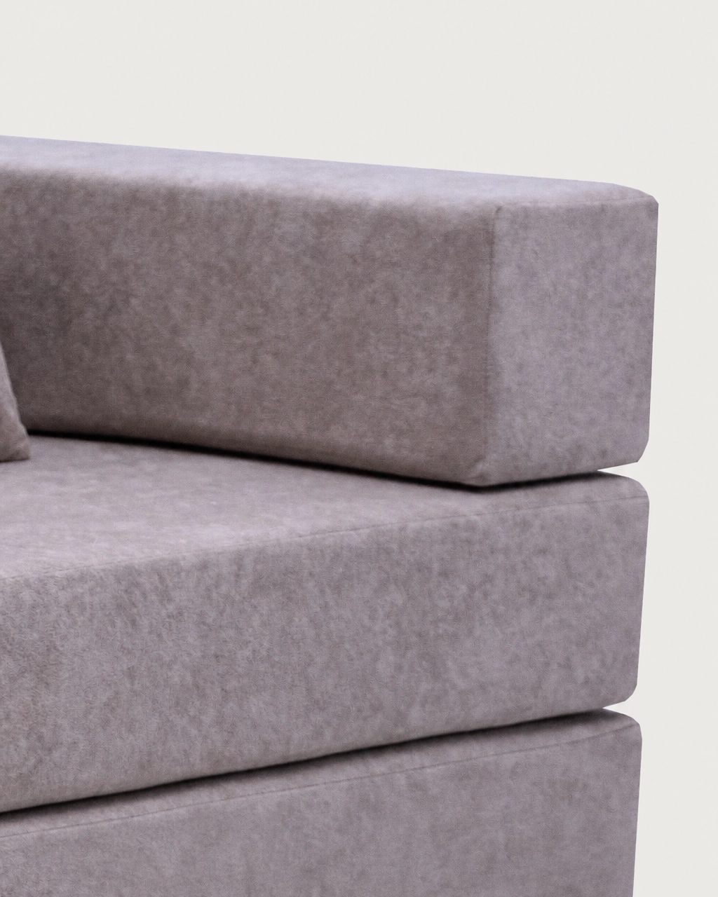 Close-up of Lola 2-Seater Sofa Bed armrest with taupe textured fabric