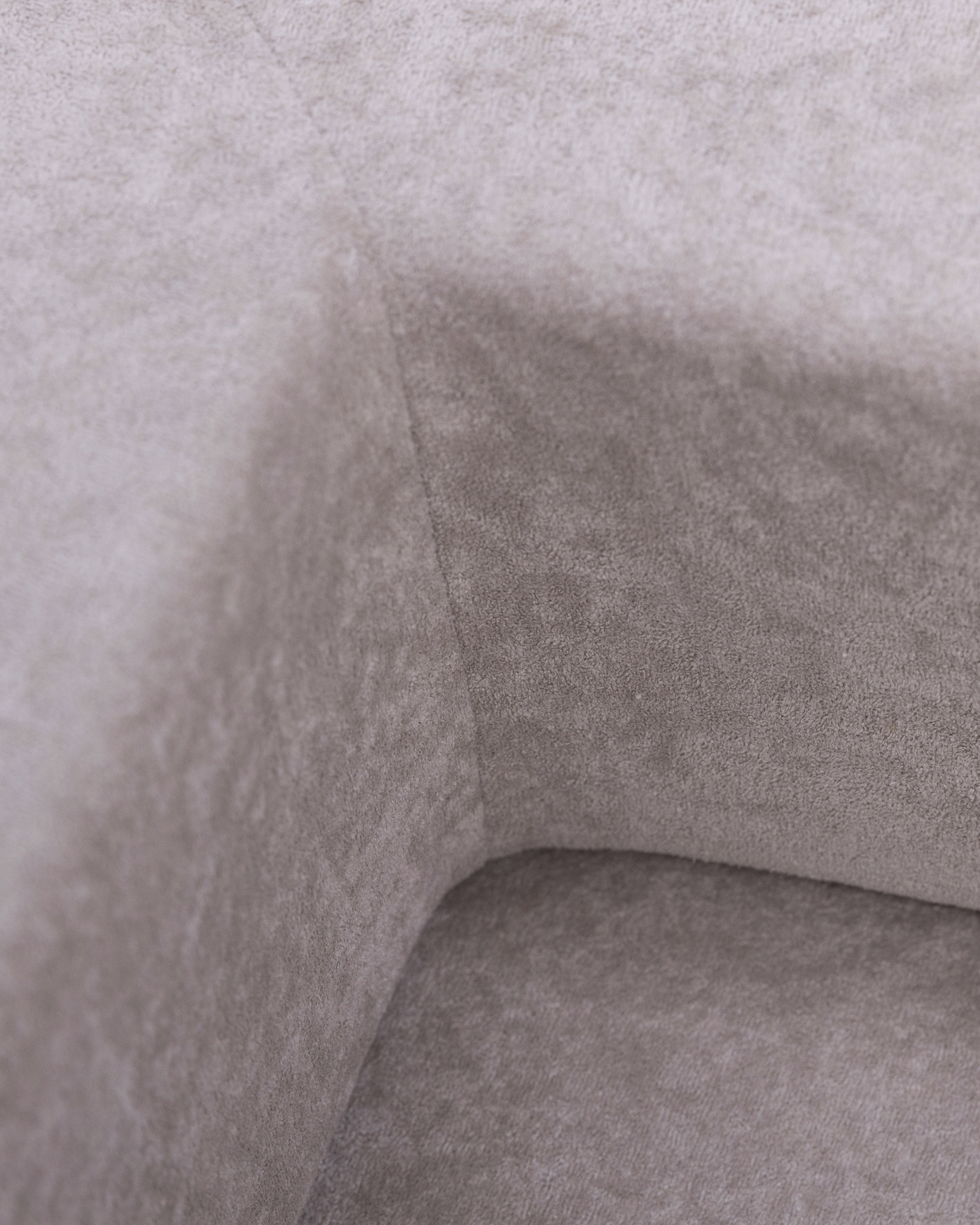 Detail of Lola 2-Seater Sofa Bed upholstery with taupe textured fabric
