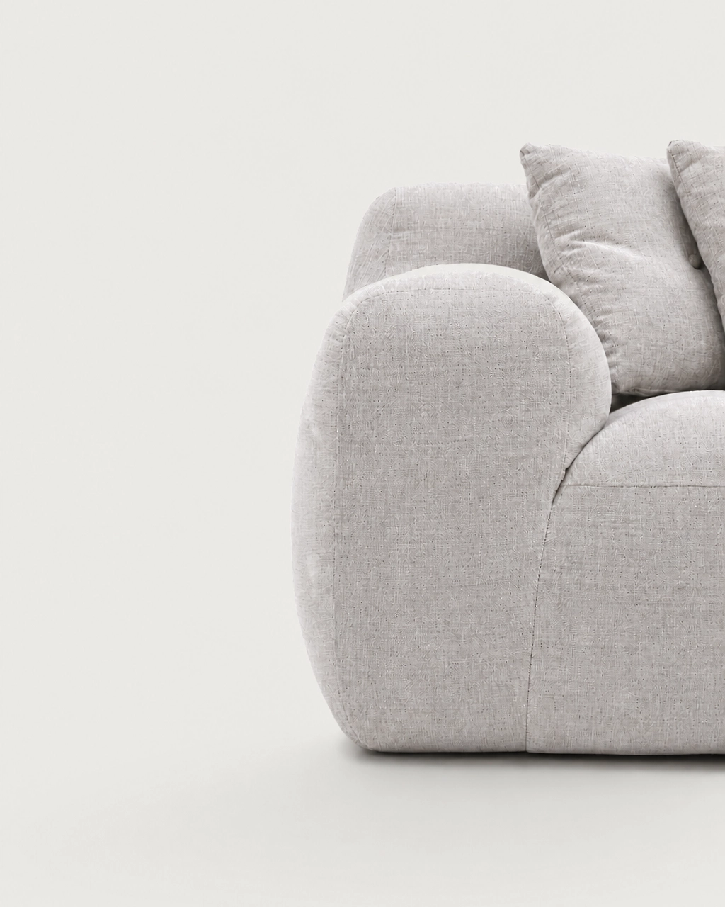 Close-up of Marley 2-Seater Modular Sofa armrest in textured off-white fabric upholstery