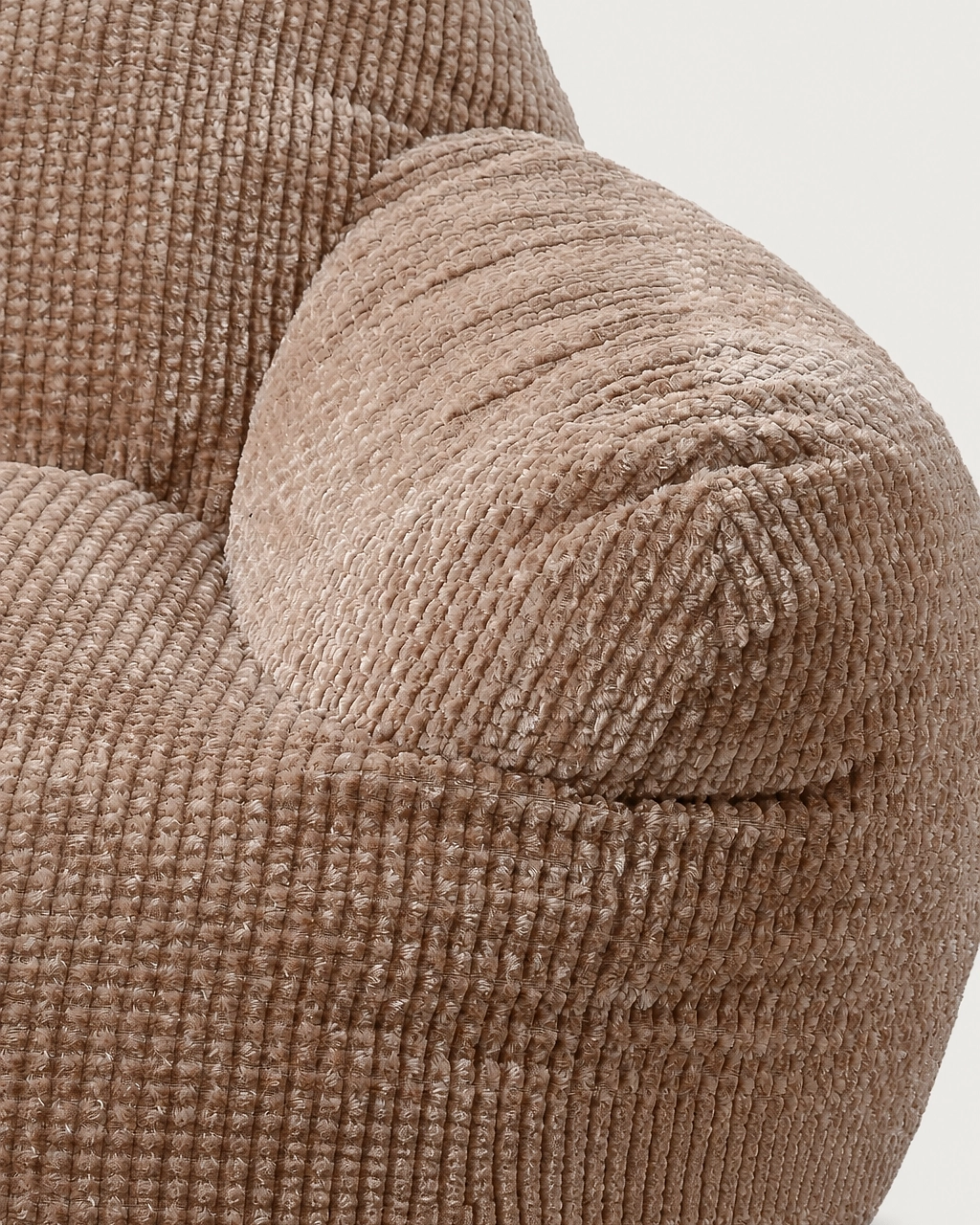 Nina Kids' Upholstered Armchair close-up in textured taupe fabric