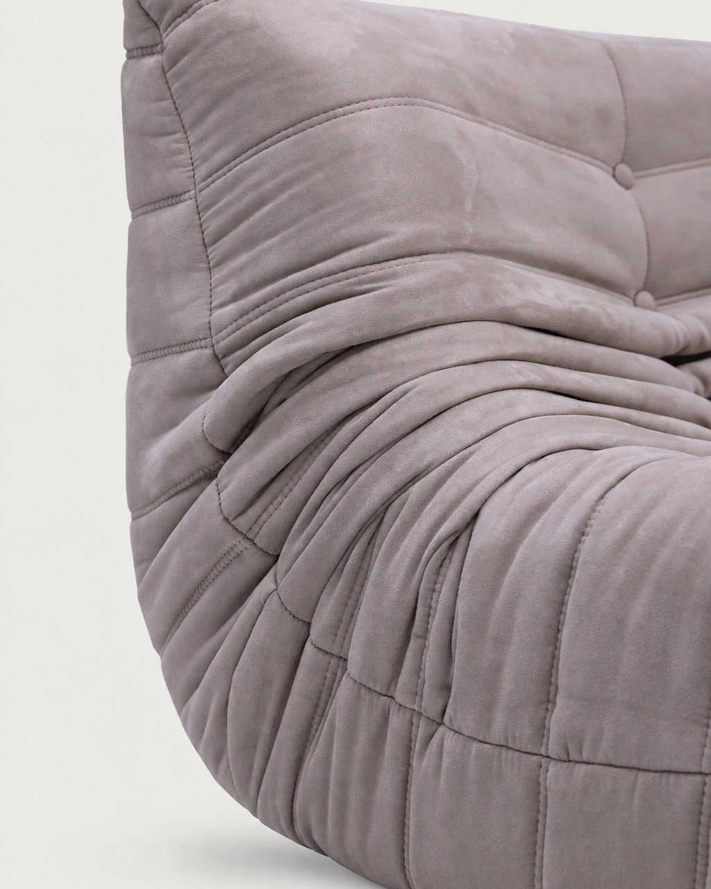 Close-up of Paco 2-Seater Upholstered Armchair in taupe fabric