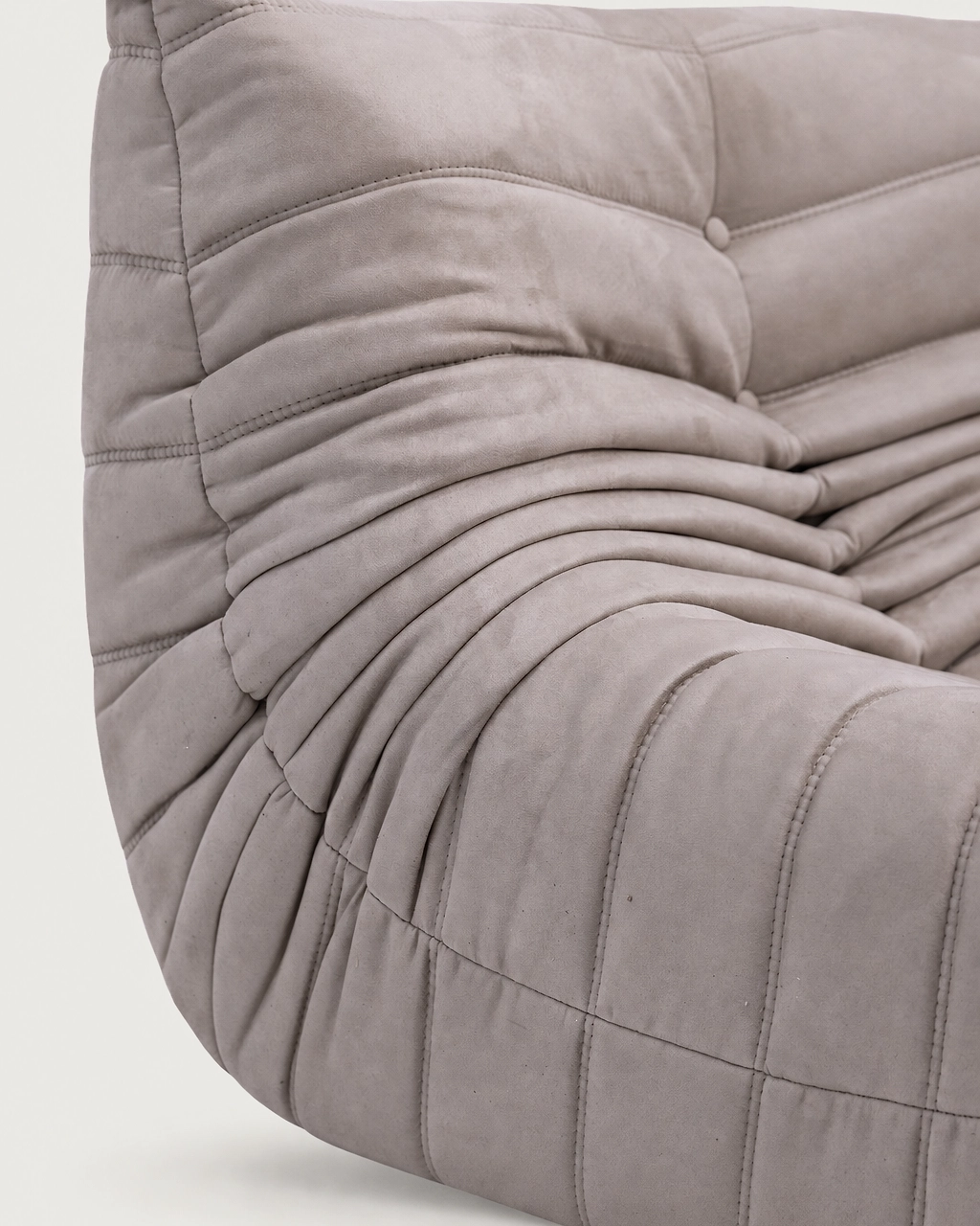 Close-up of Paco 2-Seater Armchair in taupe upholstered fabric