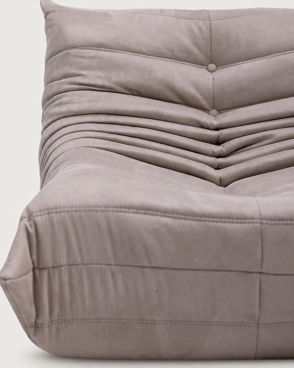 Close-up of Paco 2-Seater Upholstered Armchair in taupe fabric