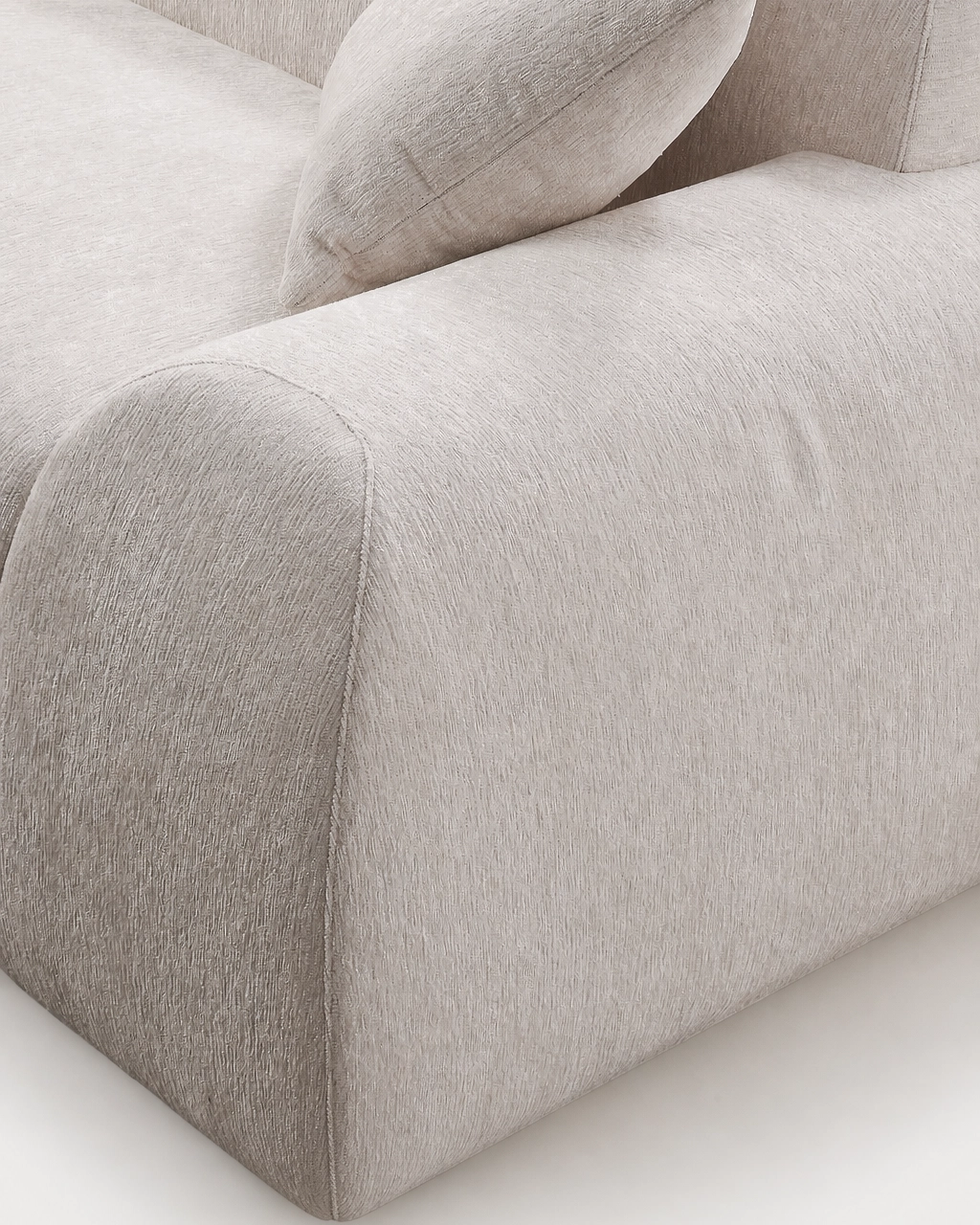 Sinatra Modular Sofa close-up with textured off-white fabric upholstery and cushion