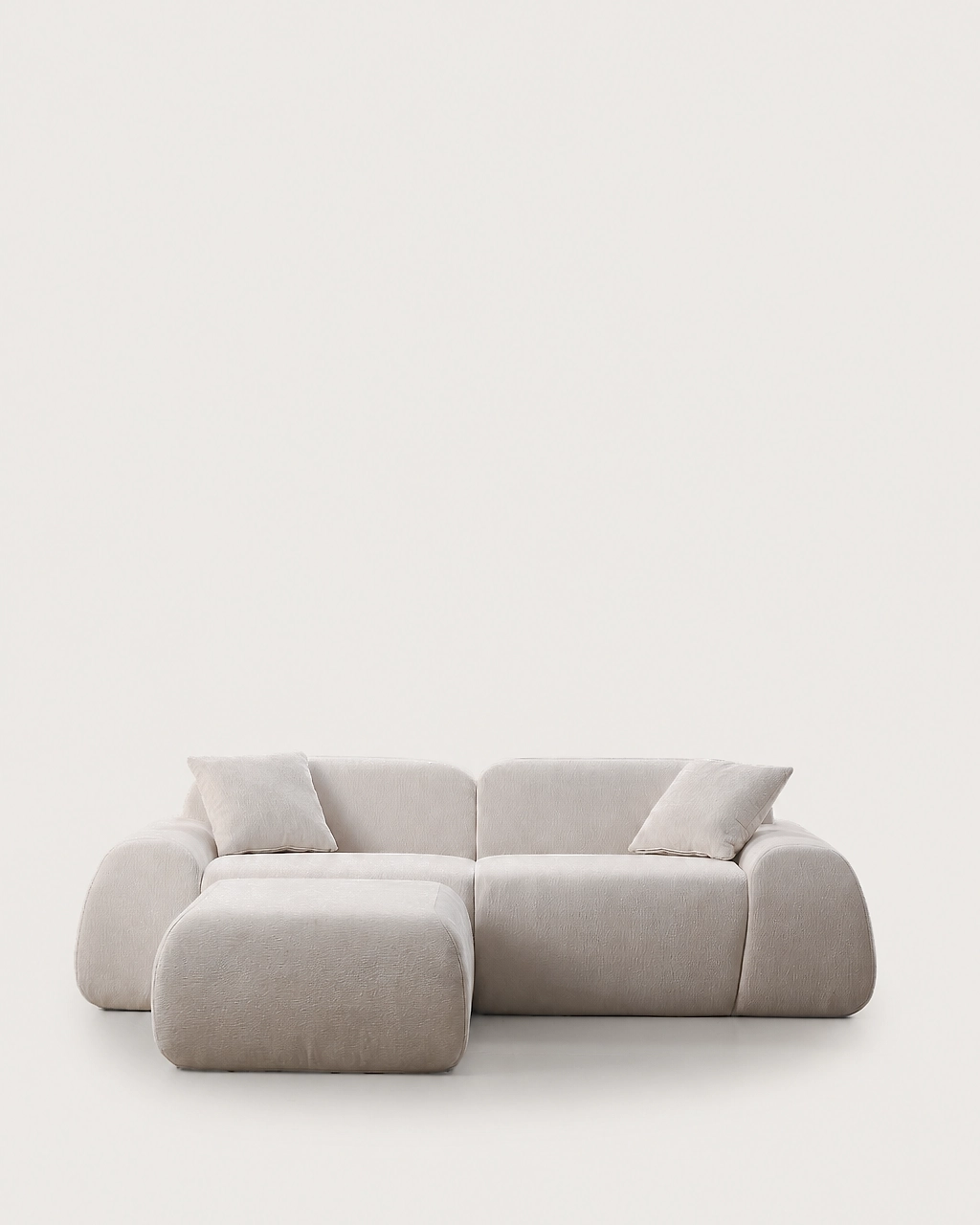 Sinatra 3-piece modular sofa with ottoman in off-white textured upholstery, front view