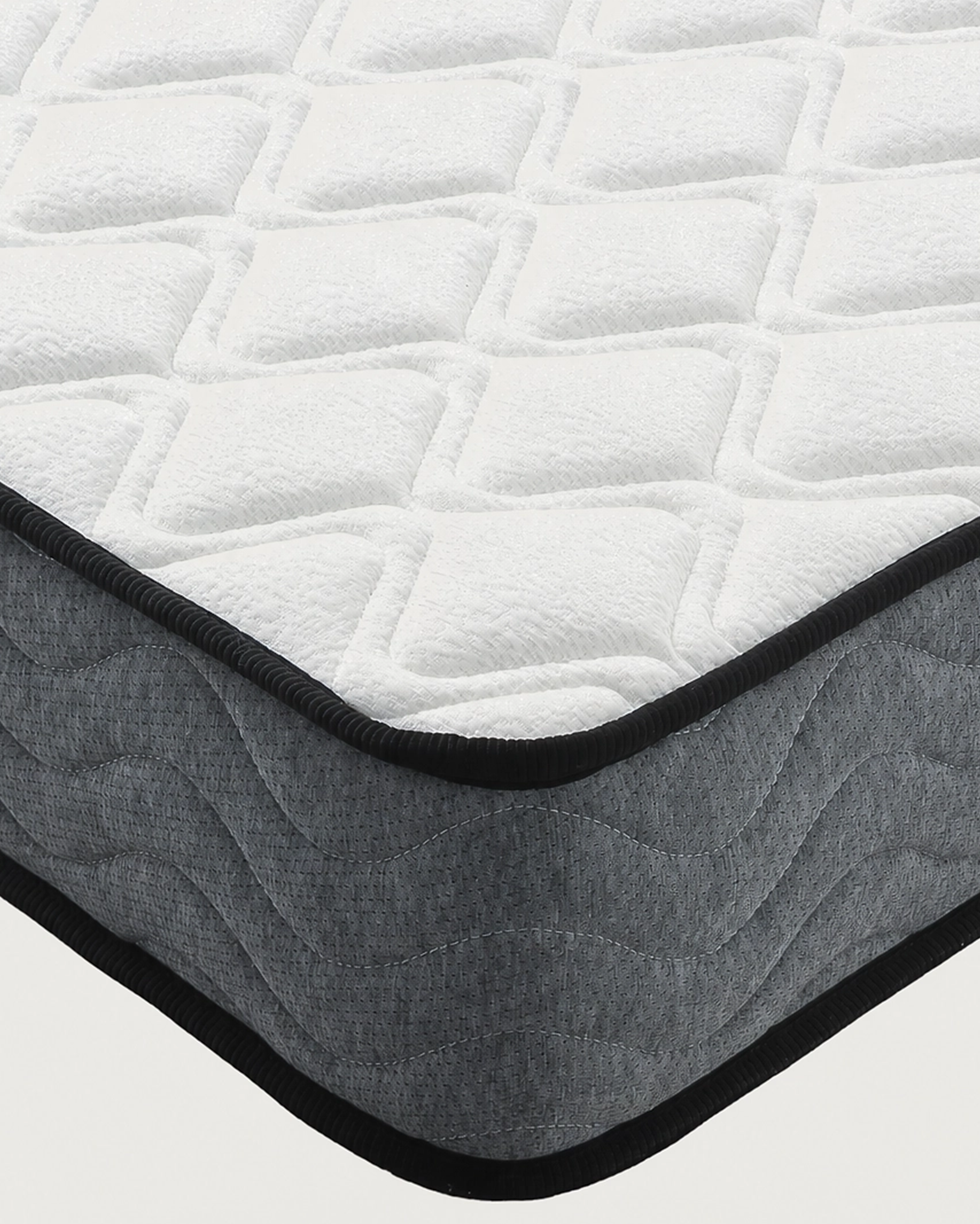 Tina Vacuum-Packed Mattress with white quilted fabric top and gray fabric sides