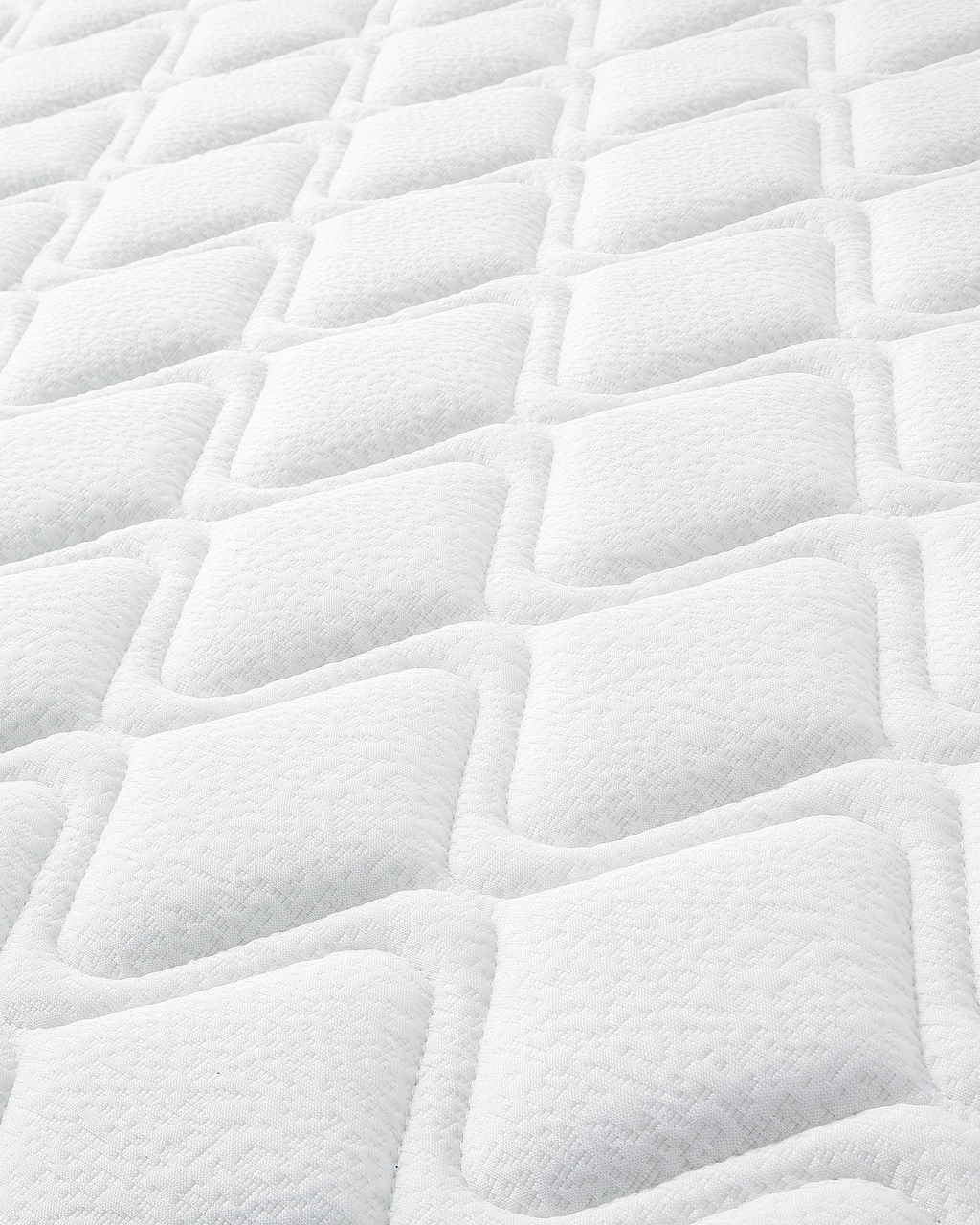 Tina Mattress vacuum-packed with white quilted fabric surface and raised square pattern