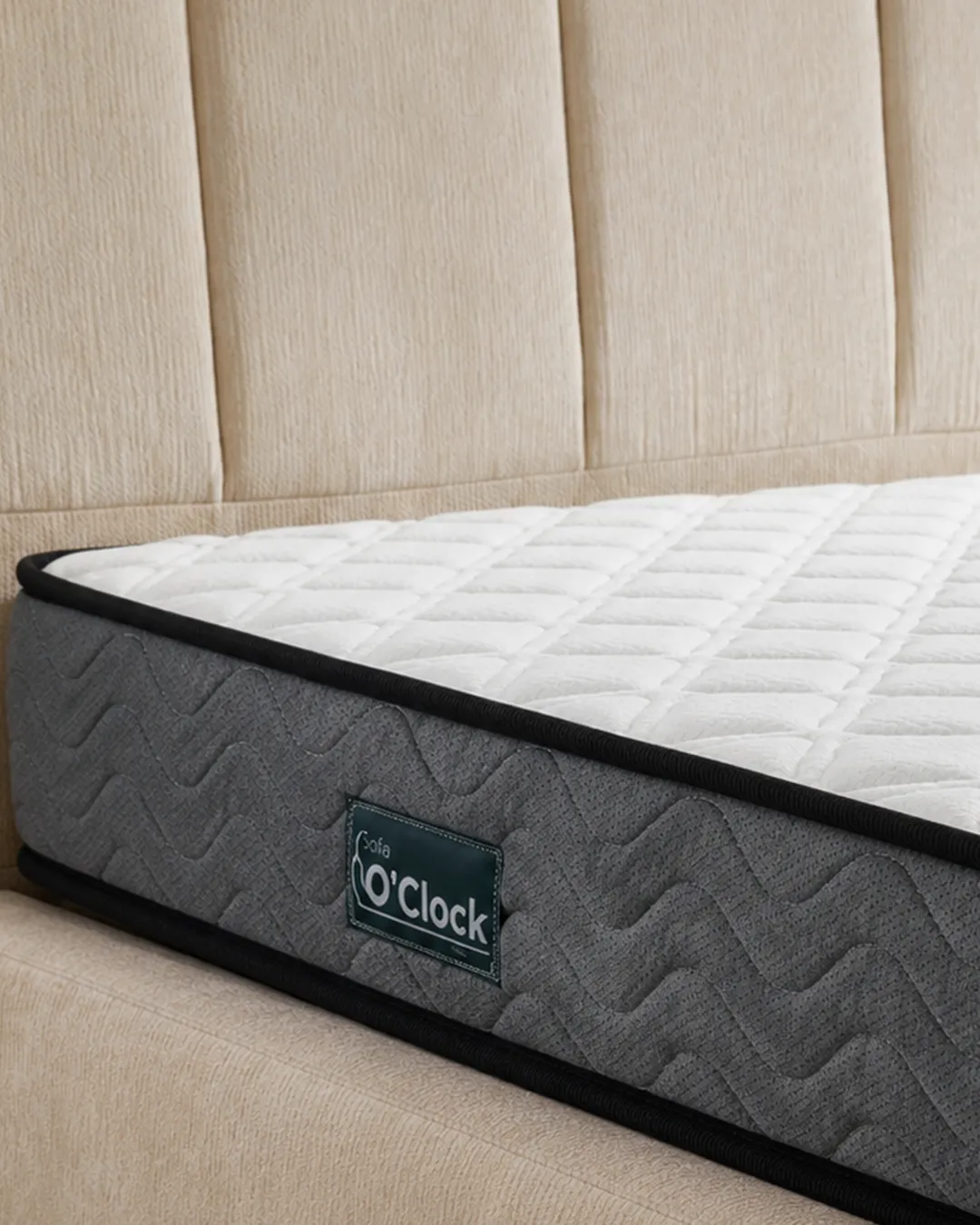 Tina vacuum-packed mattress with white quilted top and gray fabric sides