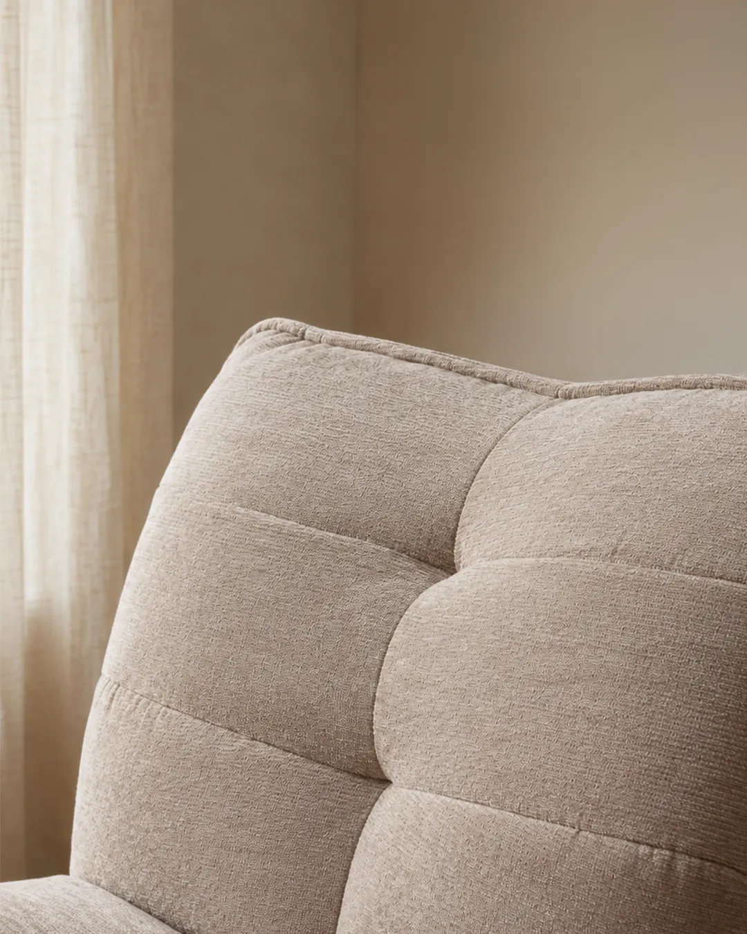 Zeca Upholstered Armchair in textured sand beige fabric with tufted back